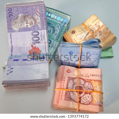 Bundle of money. Malaysia Ringgit (MYR) Bank Note RM100, RM50, RM20, RM10, RM5, RM1. - Business concept image.
