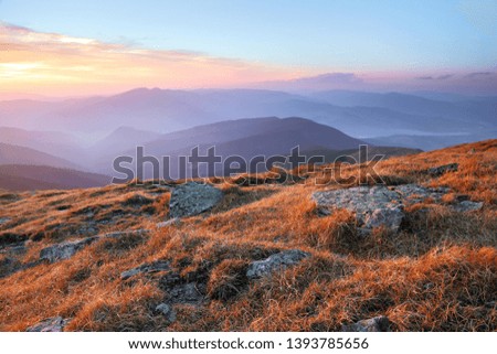 Panorama with interesting sunrise enlightens surroundings. Landscape with beautiful mountains and stones. Fantastic autumn rural scenery. Touristic resort Carpathian national park, Ukraine Europe.