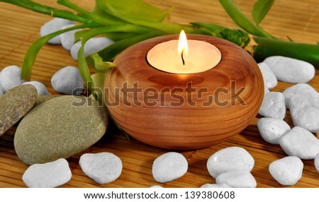 PHOTO WOODEN CANDLE WHITE STONES FOR SPA