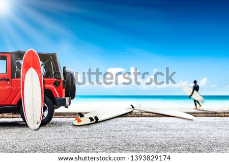 Red summer car on beach. Young surfer and summer sunny day. Free space for your decoration. 