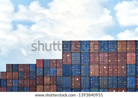 Industrial Container yard for Logistic Import Export business
and logistics in harbor industrial packing and water transport International shipping cargo with cloud sky background. Copy space