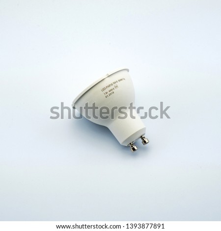 Concept photo of white light bulb isolated on white background. Perfect for filling the catalog online store electrics. Studio photography.