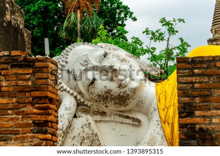 White Buddha statue in the old temple