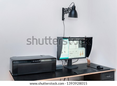 Photographer, graphic or image retoucher workplace desk. Horizontal image with copy space
