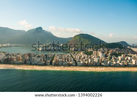 Aerial view of buildings on the beach front with a mountain range in the background, Ipanema Beach, Rio De Janeiro, Brazil
