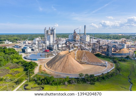 Aerial view of a paper mill Royalty-Free Stock Photo #1394204870