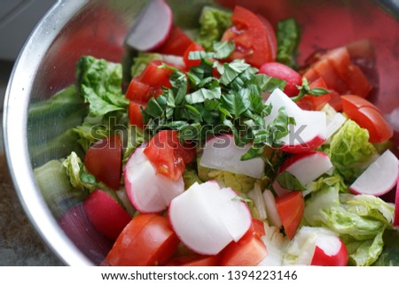 Fresh salad served in different variations in bowls on the tray                     