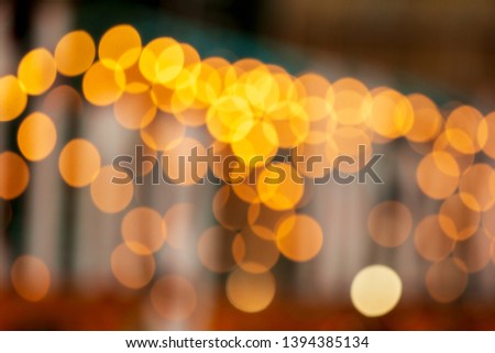 Abstract background Yellow bokeh lights.