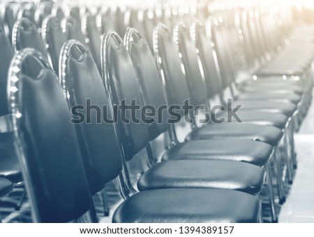 Many chairs at the seminar