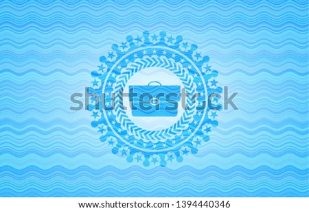 briefcase icon inside water wave badge.