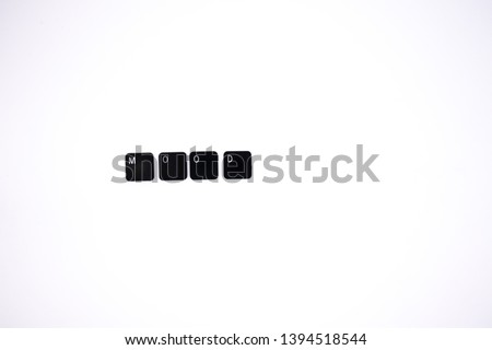 Computer buttons creating slang expressions and words on white background, closeup, isolated, studio photo