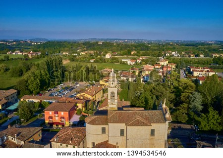 Aerial photography with drone. Church Pacengo in Garda lake, Italy. 