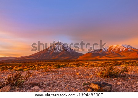 Ultra long exposure merged time-lapse of sunset at Licancabur 6000m volcano in Atacama