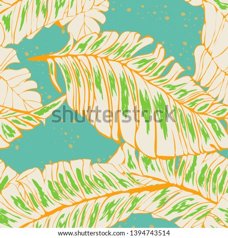 Banana Tropical leaves floral print exotic seamless pattern. The texture of the fabric leaves of banana and palm trees. Exotic Hawaiian print for swimsuits.