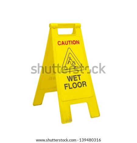 caution wet floor signs in the office room  Royalty-Free Stock Photo #139480316