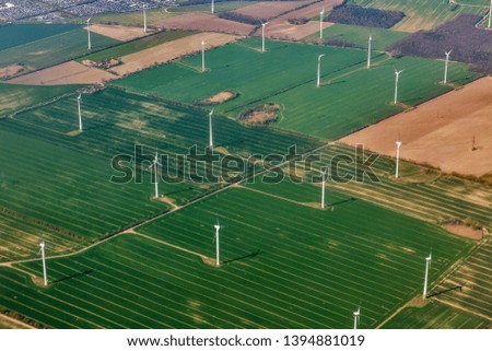 Aerial view over wind mill turbine farm close to Berlin, Germany.