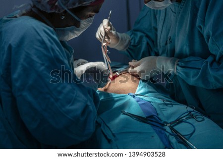 Hands of doctors during hospital surgery