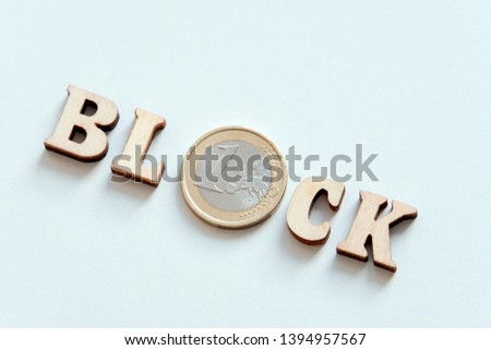 Wooden inscription Block of wooden letters and a silver coin in one Euro. Private Internet access.