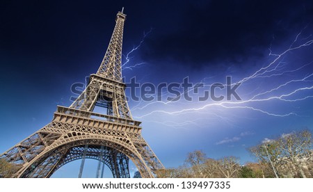 Beautiful view of Eiffel Tower in Paris with storm.