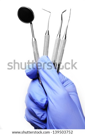 Dental instruments with gloves and mask