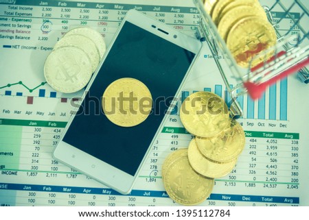 the concept of finance economy digital market trade by smartphone use bitcoil to payment and trade exchange business in digital market.the coin was technology sign to replace  real money  in the bank