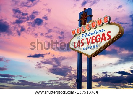 Welcome To Las Vegas neon sign on sunset sky Royalty-Free Stock Photo #139513784