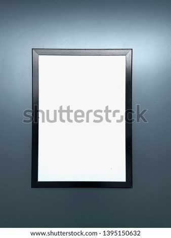 White copy space or empty canvas  on mock up photo wooden black frame with gray wall.
