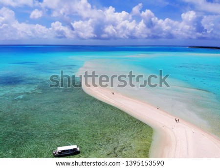 Aerial View of a Sandy Tropical Beach and a Boat (Kayangel, Palau)