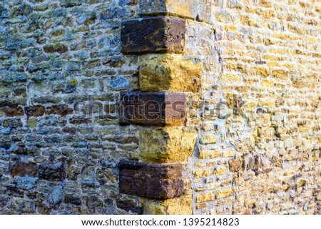 old castle tower brick wall background in uk