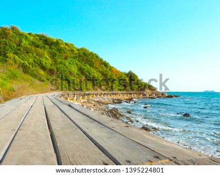 Wooden bridge and mountain at the seaside at Koh Larn Pattaya Thailand on Summer, Travel, Vacation and Holiday concept
