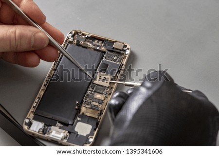 smartphone repair on a work desk