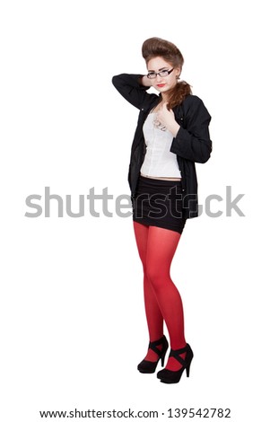 Teenage girl in black and red clothes, in glasses, adjusts her hair, isolated on white background