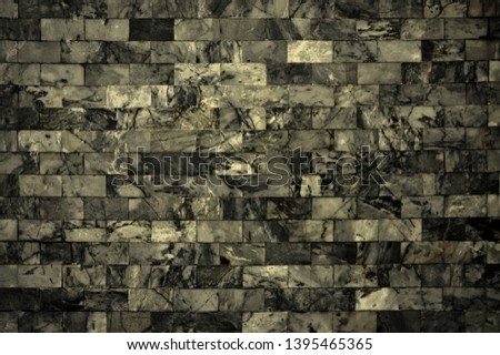 Dark marble wall pattern with high resolution. Brick wall made from marble use as texture and background.