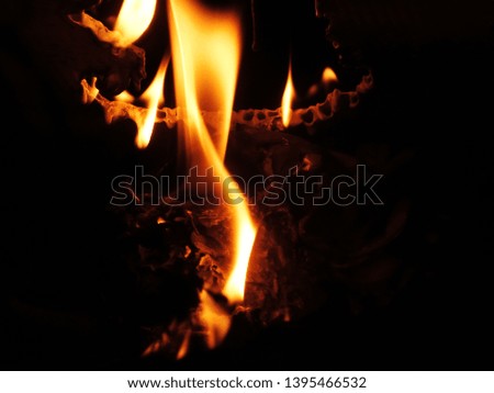 Many flames of red flames on a black background