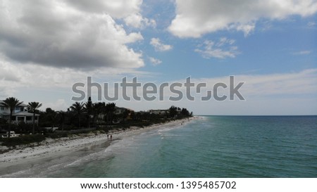 Florida clear blue water birds eye view - Floridian sandy beaches drone. city ​​on the beach Aerial view of Indian Rocks Beach. beautiful clear water, beach houses