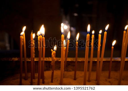 Candles light in the holy sepulchre cathedral in Jerusalem