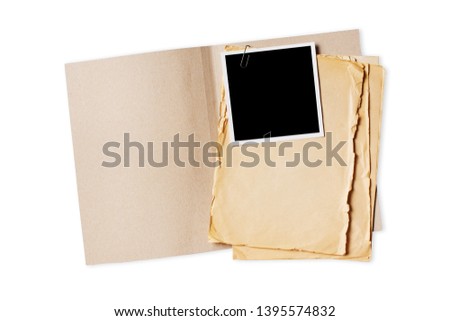 Folder with old yellowed paper sheets and mock up for vintage photo isolated on white background