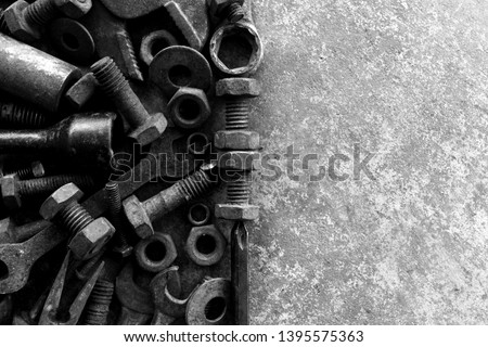 many rust steel on cement ground in black and white photography