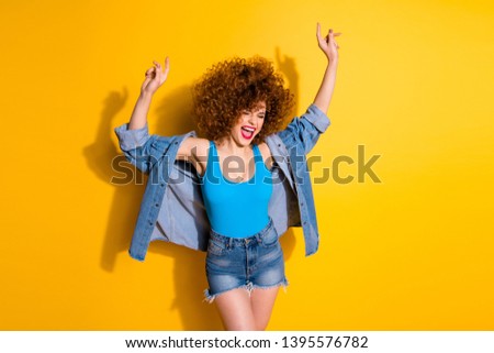Portrait of her she nice crazy lovely charming attractive glamorous cheerful cheery overjoyed girl dancing cool free spare time isolated over bright vivid shine yellow background