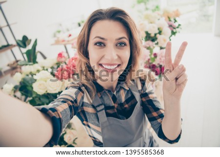 Close up photo beautiful she her lady blogger make take selfies show v-sing followers different various option retail seller offering buy buyer big choice choose owner small flower shop room indoors