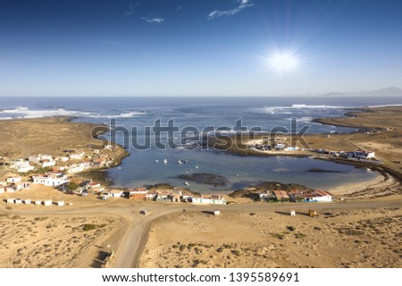 Fuerteventura landscape holiday scene with small fishing village huts