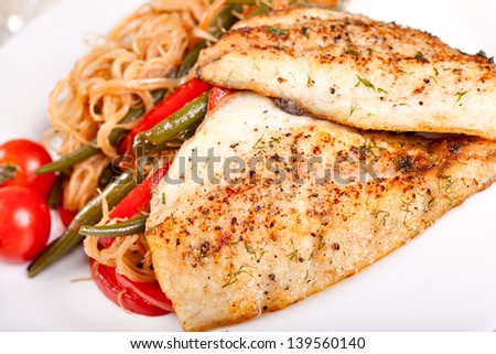 Fried whitefish with vegetables