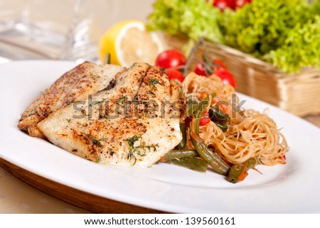 Fried whitefish with vegetables