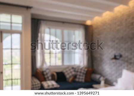 hotel resort living room interior design with large windows abstract blur background