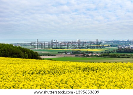 beautiful landscape with the port of Calais on the horizon Royalty-Free Stock Photo #1395653609