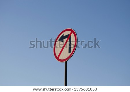 road sign on sky background