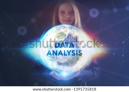 The concept of business, technology, the Internet and the network. A young entrepreneur working on a virtual screen of the future and sees the inscription: Data analysis