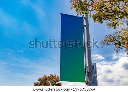 billboard mockup outdoors, lamp post banner exterior templates advertising poster at day time with street light line for advertisement street signboard . With clipping path on screen