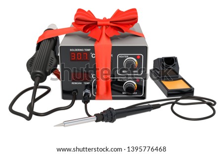 Digital Soldering Station with bow and ribbon, gift concept. 3D rendering isolated on white background