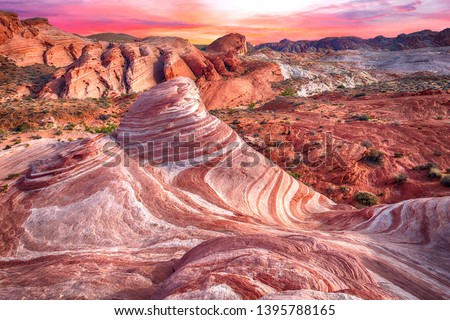 Amazing colors and shape of the Fire Wave rock in Valley of Fire State Park, Nevada, USA Royalty-Free Stock Photo #1395788165